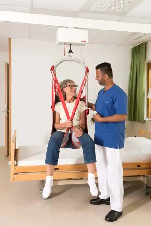 Molift Air 200 Ceiling Lift Motor being used by patient Reliable Ramps 