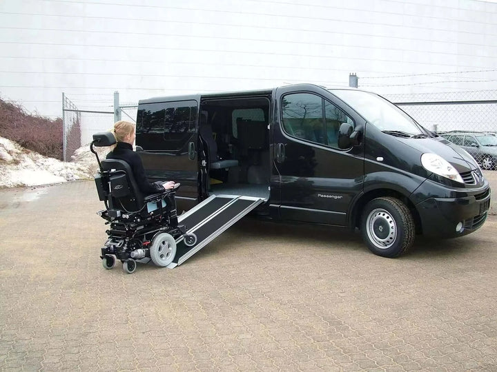 Guldmann - Stepless EasyFold Pro Portable Wheelchair Ramp being used with a van