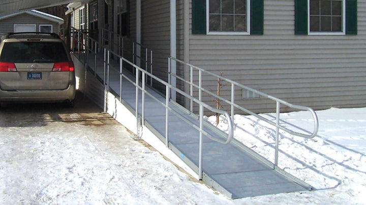 AlumiRamp - Armada Modular Aluminum Ramp System + Handrails - next to a home in a snowy area