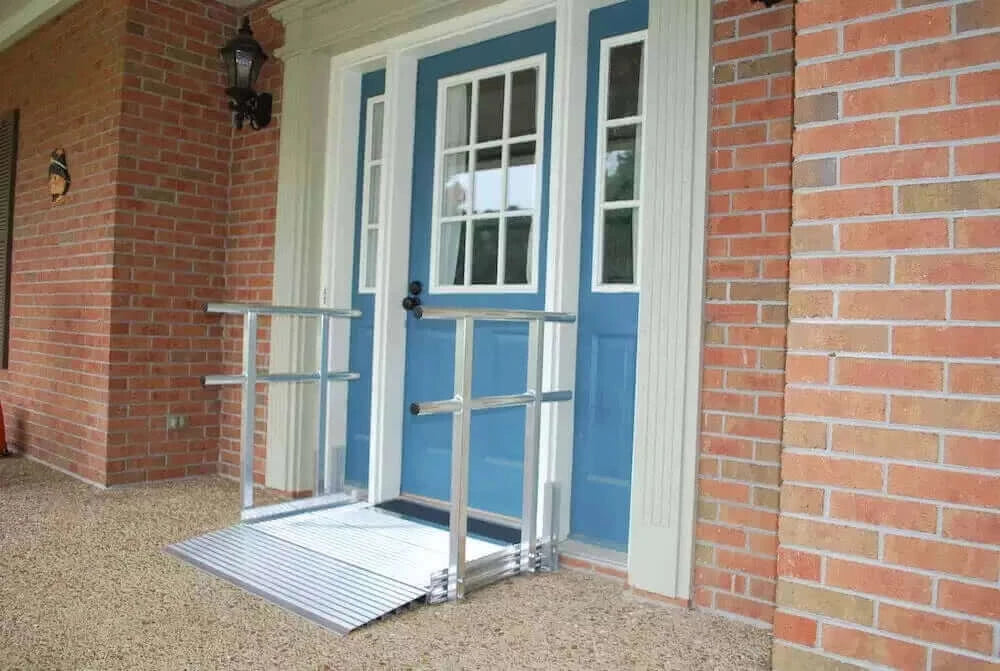 American Access - Big Lug Aluminum Modular Wheelchair Ramp - opposite side view of ramp being used at a home's main entrance