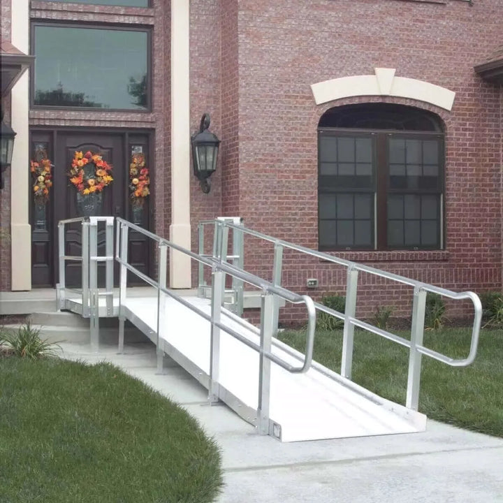 PVI - Modular Platform - XP Aluminum Wheelchair Ramp with Handrails zoomed out view of it used at a home's front entrance
