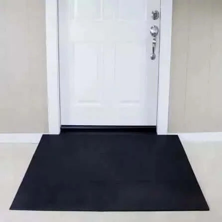 SafePath - SafeResidential ADA Rubber Threshold Ramp being used in front of a white door
