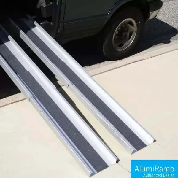 AlumiRamp - AlumiLite Telescopic Aluminum Wheelchair Van Channel Ramp - coming out of a van onto a curb