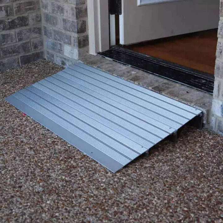 American Access - Hero Aluminum Threshold Ramp for Wheelchairs - ramp being used at a doorway