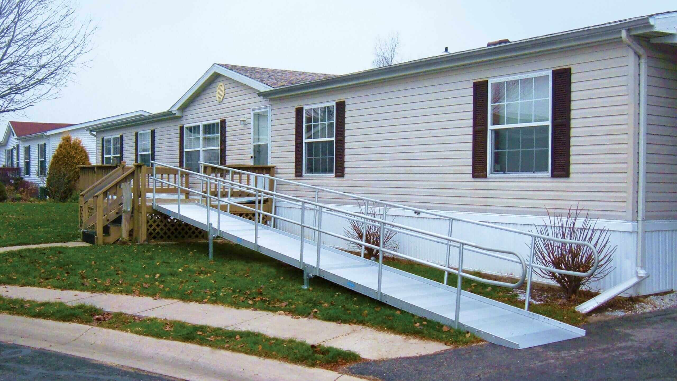 armada modular wheelchair ramp in front of a mobile home