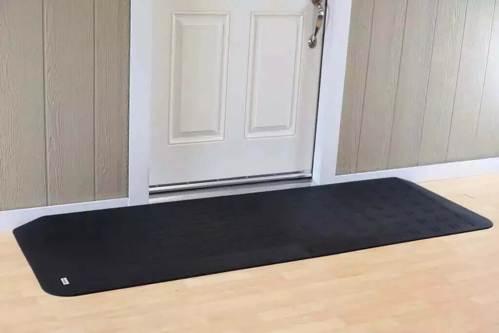 SafePath - EZ Edge Transition Rubber Threshold Ramp - 82" Width being used in front of a white door