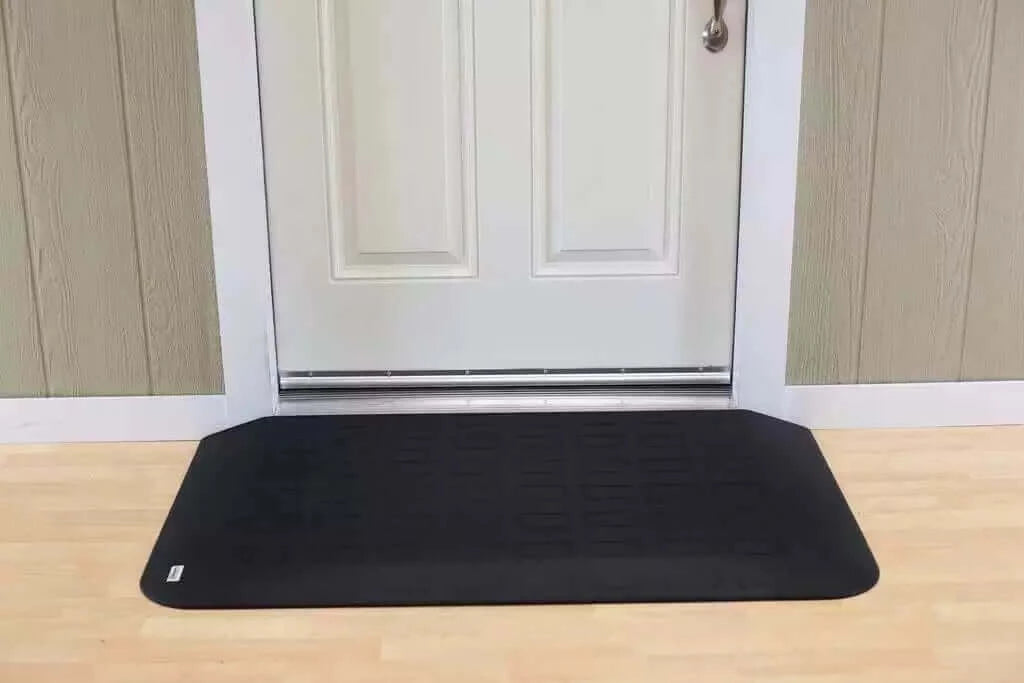 SafePath - EZ Edge Transition Rubber Threshold Ramp - 46" Width being used in front of a white door
