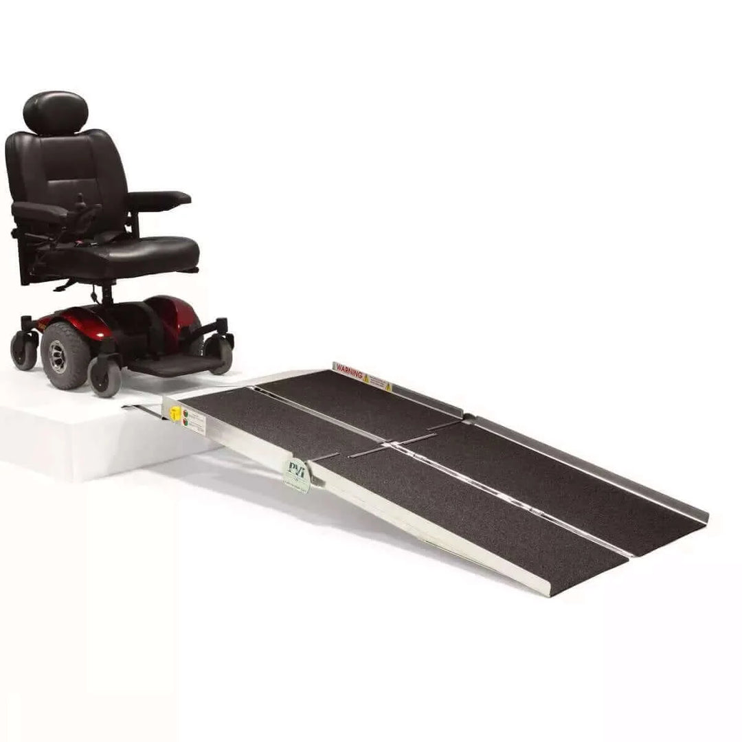 PVI - Aluminum Multi-Fold Rear Door Reach Portable Van Wheelchair Ramp with a mobility scooter and white background