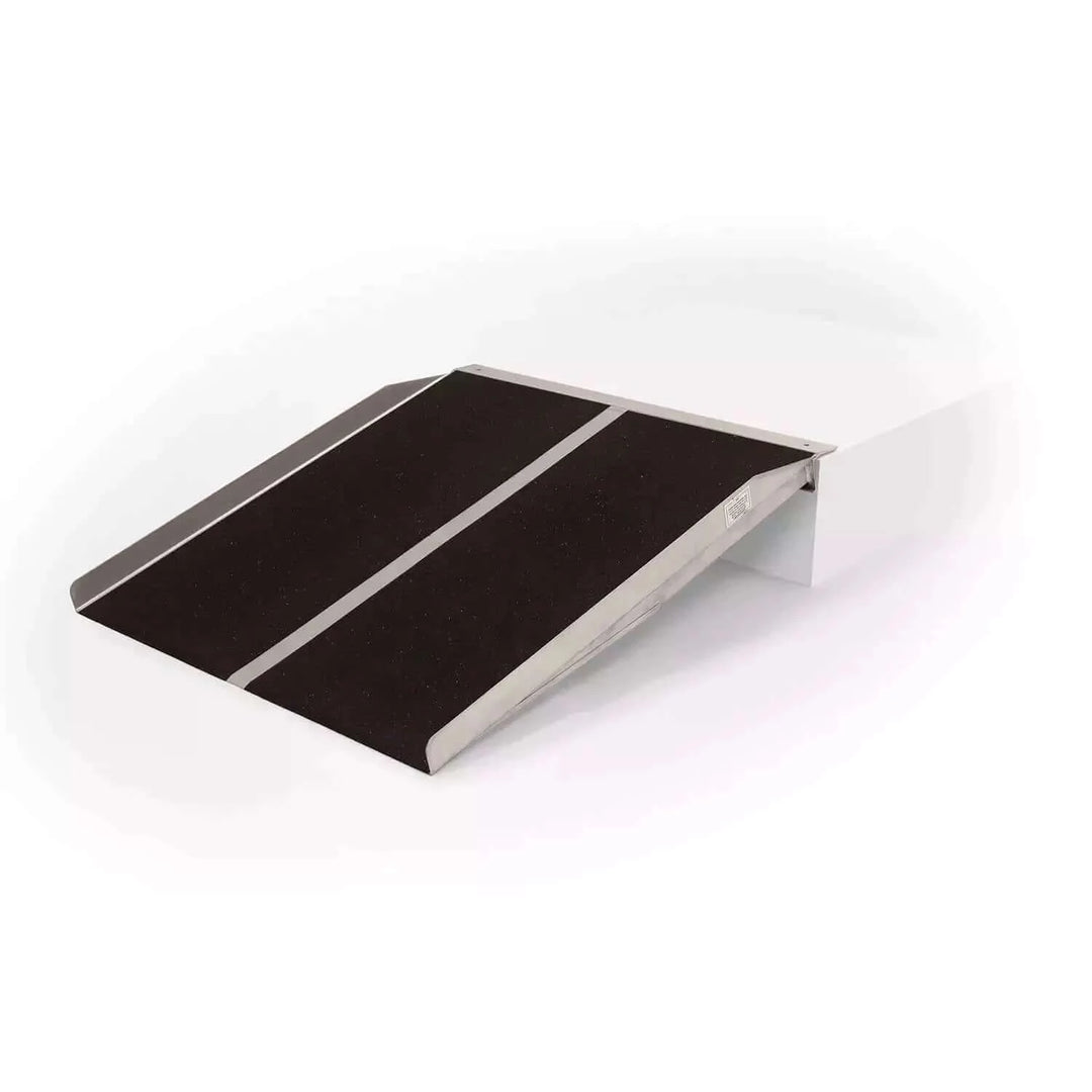 PVI - Aluminum Solid Mobility Wheelchair Ramp with a white background showing its use with a threshold