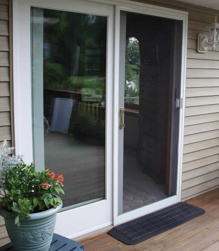 AlumiRamp Rubber Threshold Ramp for Wheelchairs - setup in front of a patio door