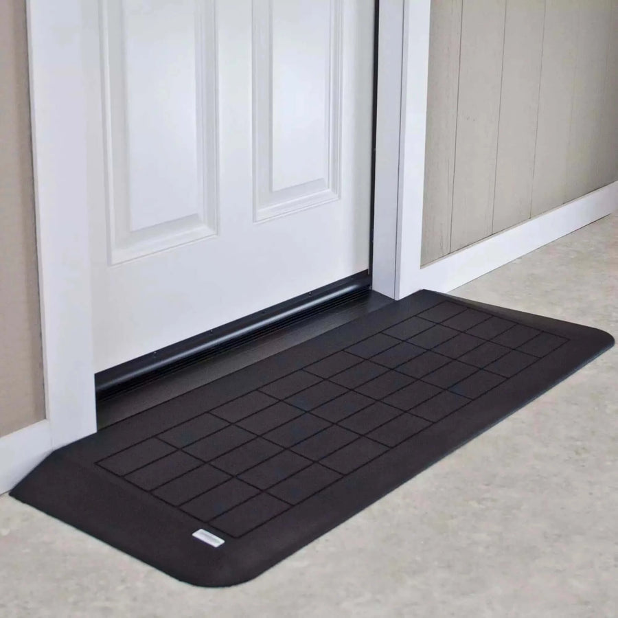 AlumiRamp Rubber Threshold Ramp for Wheelchairs - setup in front of a white door