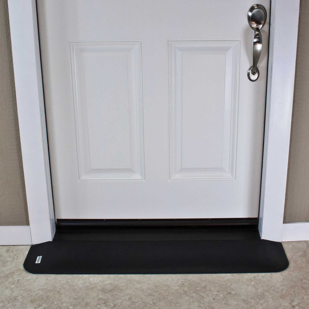 AlumiRamp Rubber Threshold Ramp for Wheelchairs - front view in front of a white door